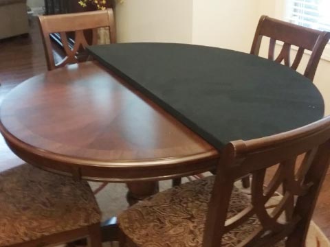 Photo: 54-inch card table extender folded in half to show fabric underside