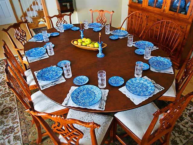 Dining table enlarged from six seats to ten seats with expansion pad